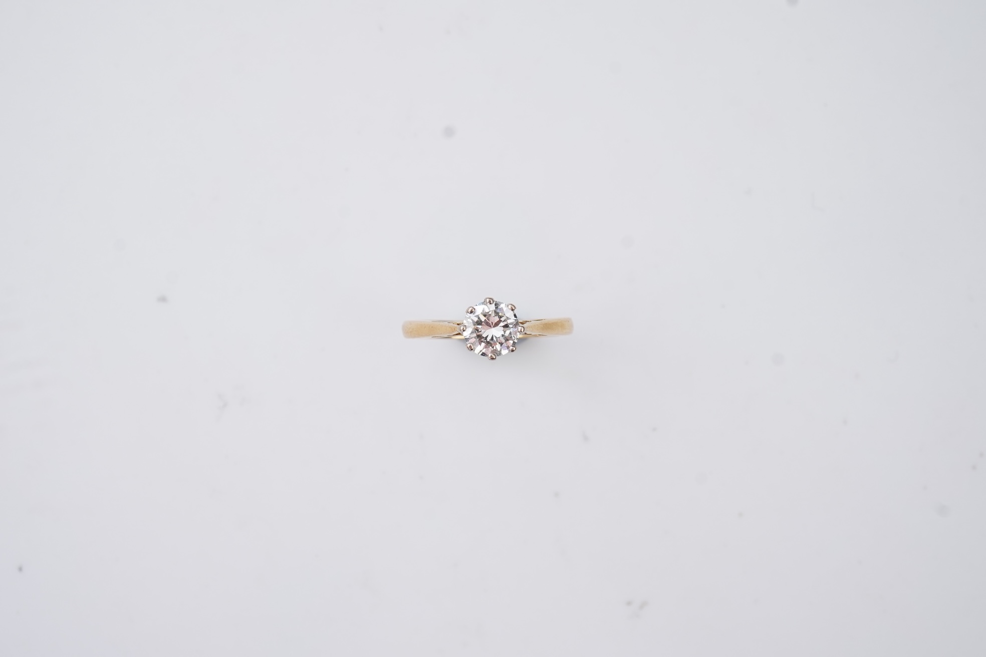A diamond solitaire ring
